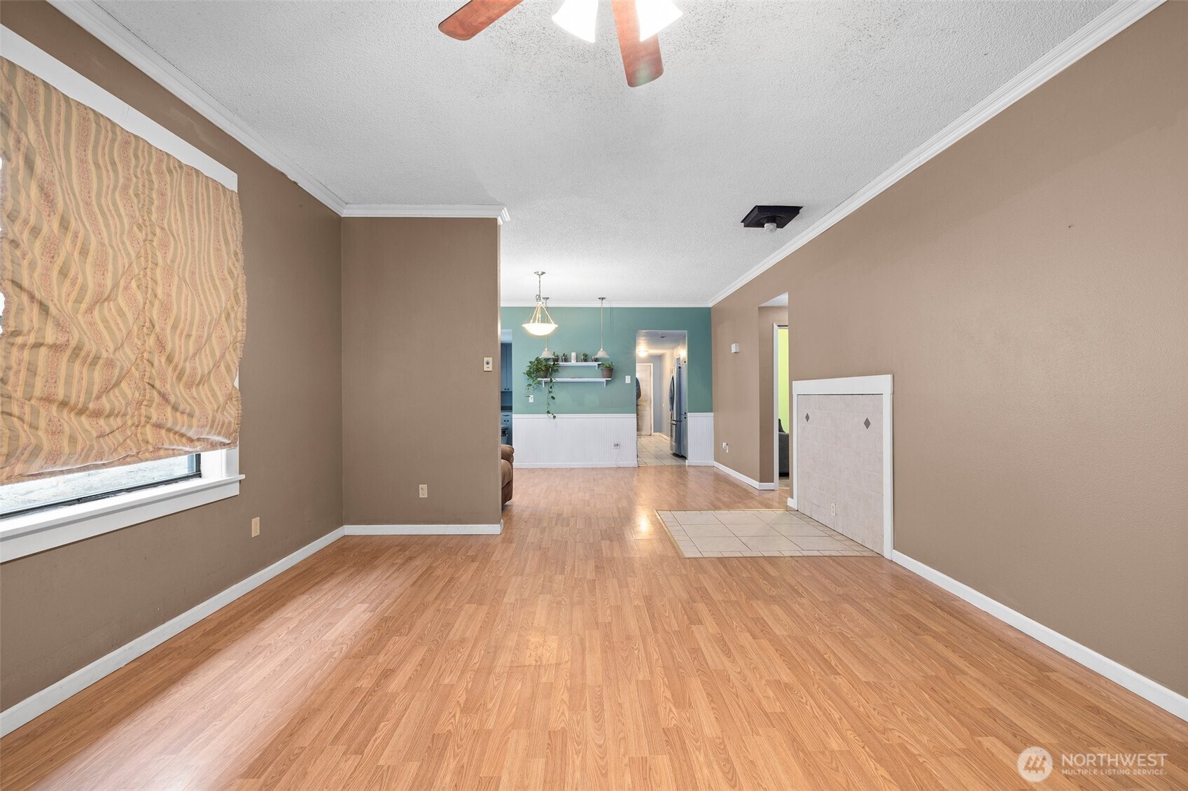 3710 Rucker Avenue Everett, WA 98201 - Photo 8 of 33 a view of livingroom with hardwood floor and window