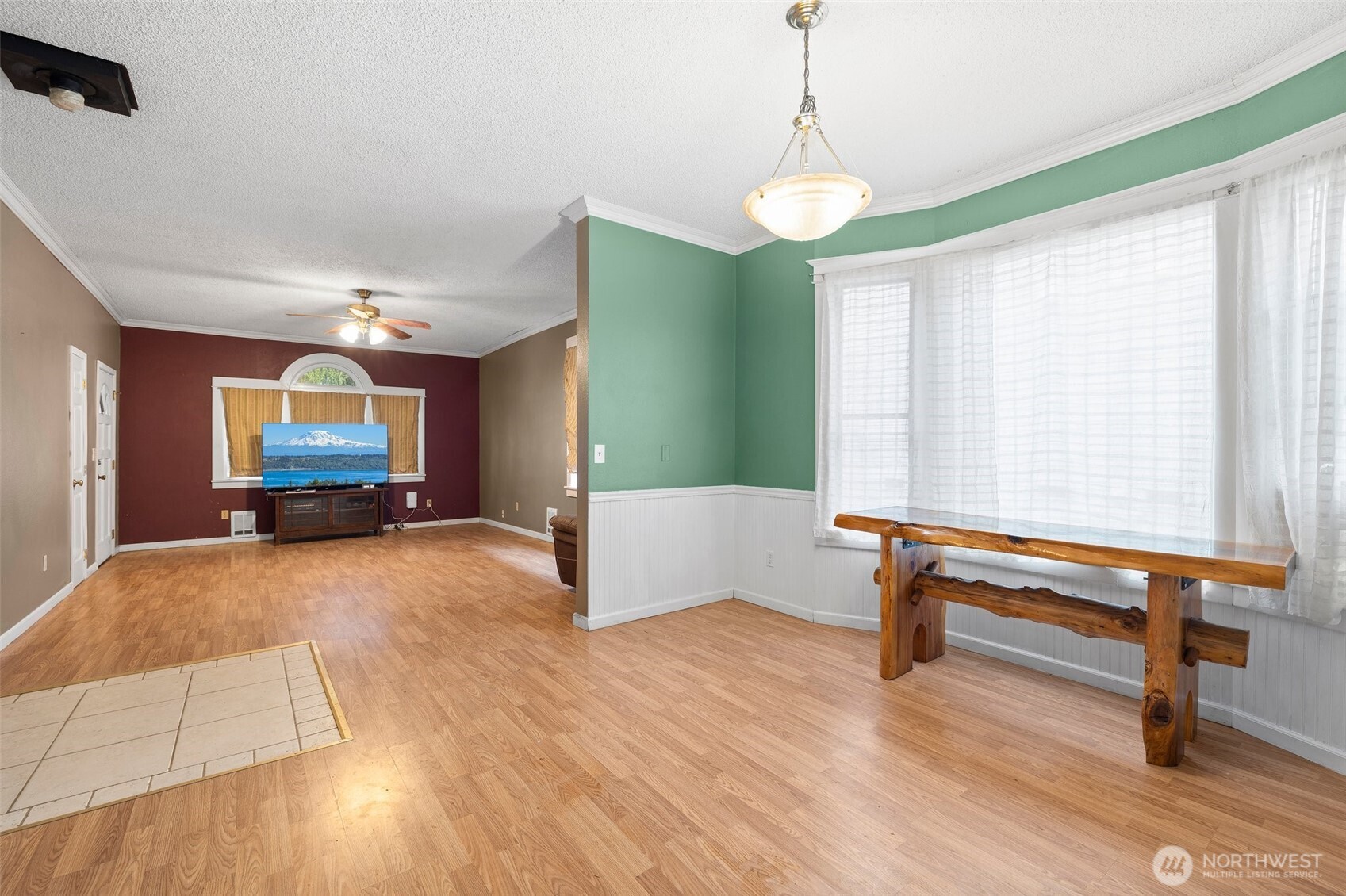 3710 Rucker Avenue Everett, WA 98201 - Photo 9 of 33 a bedroom with furniture and a window