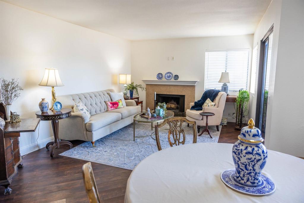 2910 Elm Tree Court Spring Valley, CA 91978 - Photo 1 of 1 a living room with furniture and a fireplace