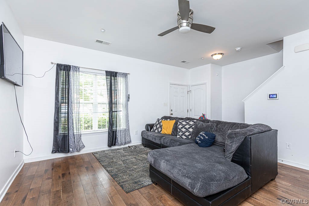 12124 Perdue Springs Loop Chester, VA 23831 - Photo 2 of 26 a living room with furniture and a window