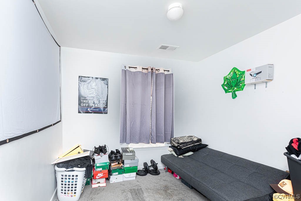 12124 Perdue Springs Loop Chester, VA 23831 - Photo 22 of 26 a room with furniture and a potted plant