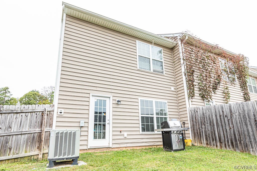 12124 Perdue Springs Loop Chester, VA 23831 - Photo 24 of 26 a view of back yard of the house