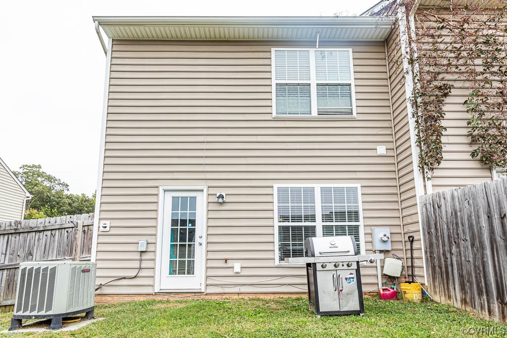 12124 Perdue Springs Loop Chester, VA 23831 - Photo 26 of 26 a view of a house with a yard and sitting area