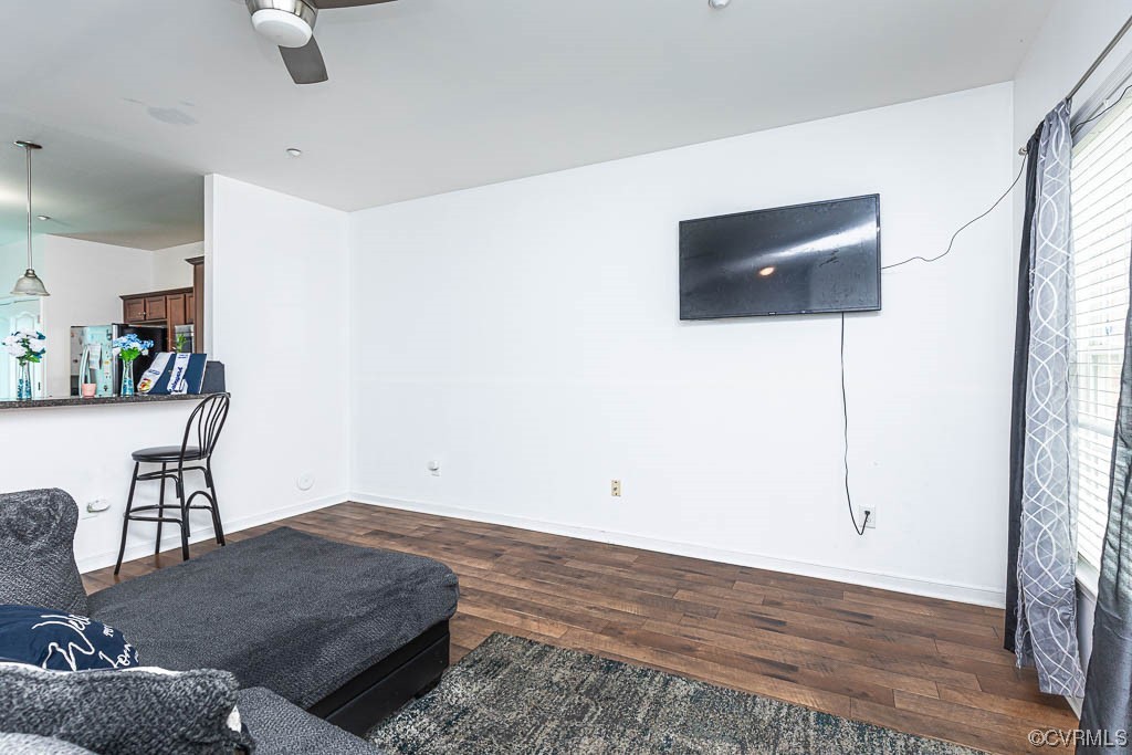 12124 Perdue Springs Loop Chester, VA 23831 - Photo 5 of 26 a living room with furniture and a flat screen tv