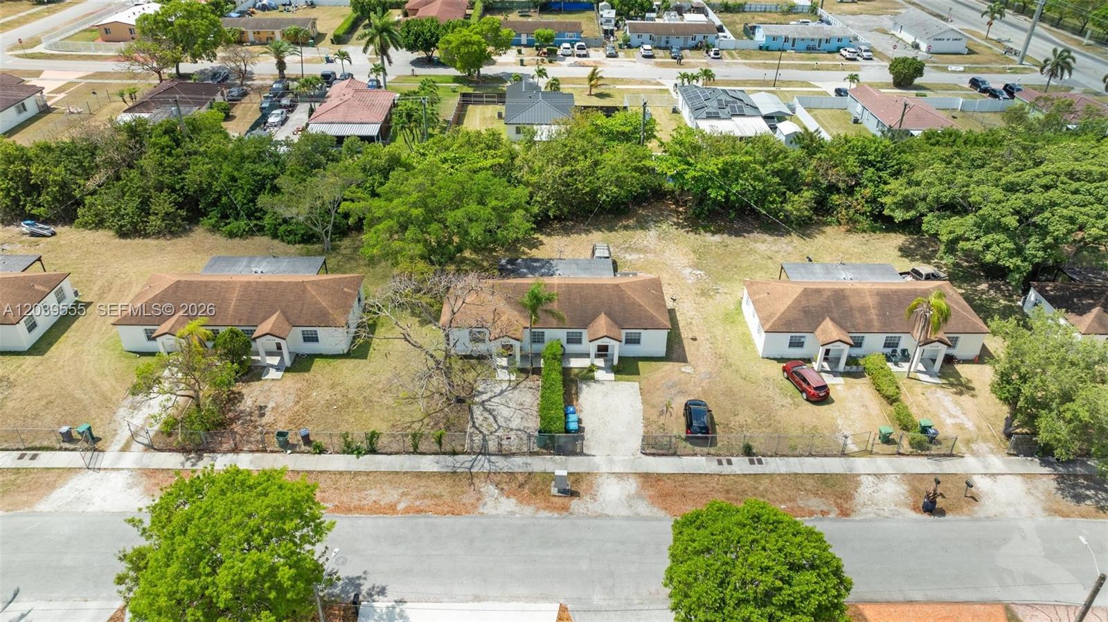 10544 Southwest 182nd Street Miami, FL 33157 - Photo 11 of 15 an aerial view of residential houses with yard