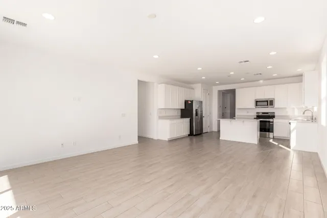 a view of kitchen with wooden floor