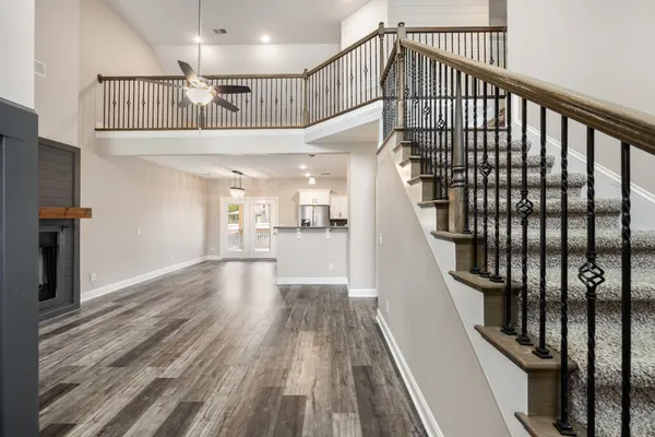 a view of staircase with white walls