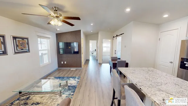 a view of a kitchen and dining room