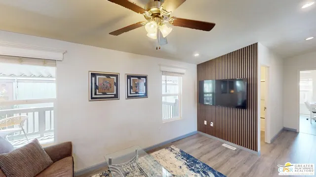a view of livingroom with furniture and window