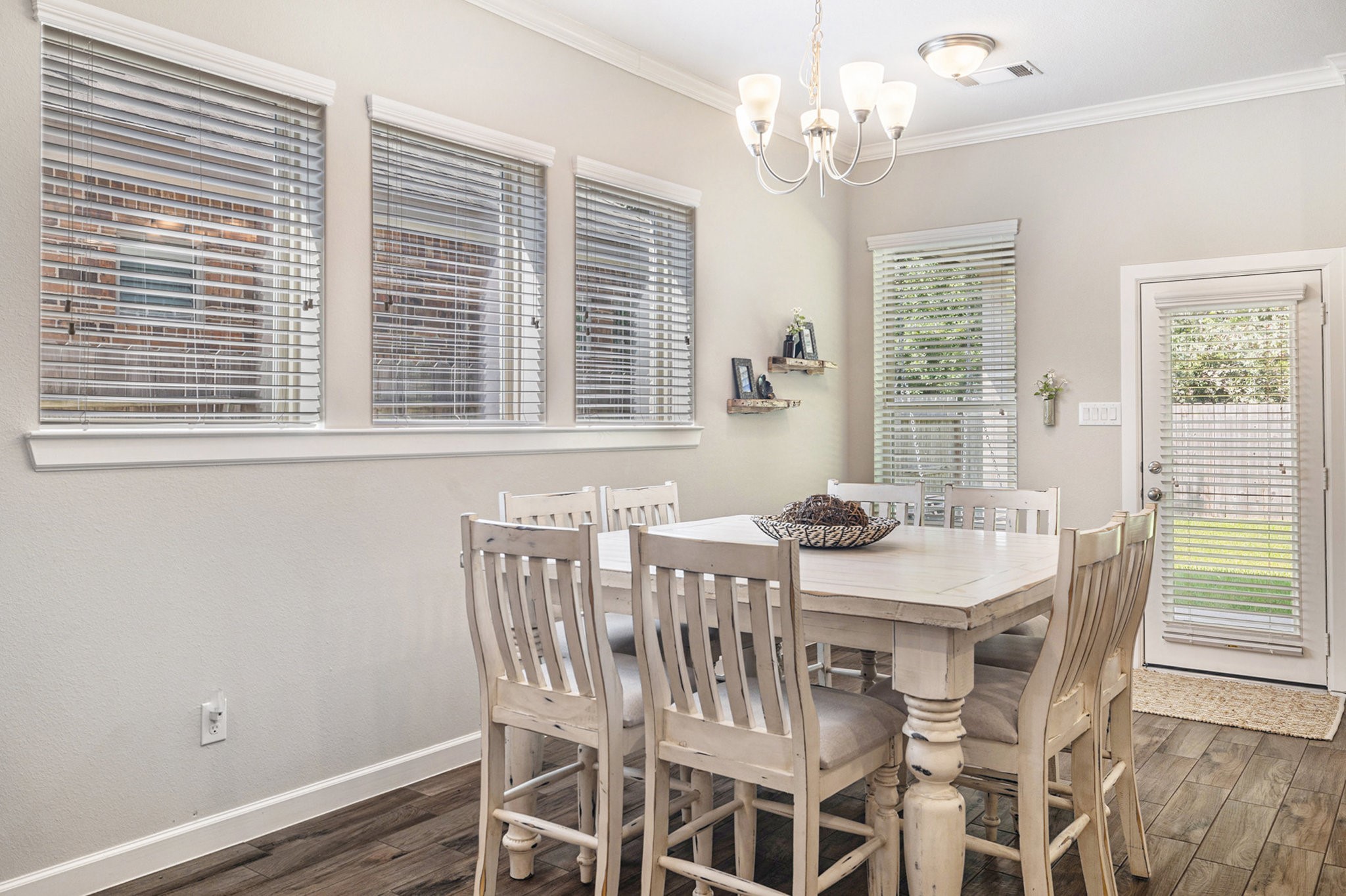 1126 Audrey Trail Tomball, TX 77375 - Photo 15 of 35 a view of a dining room with furniture window and wooden floor
