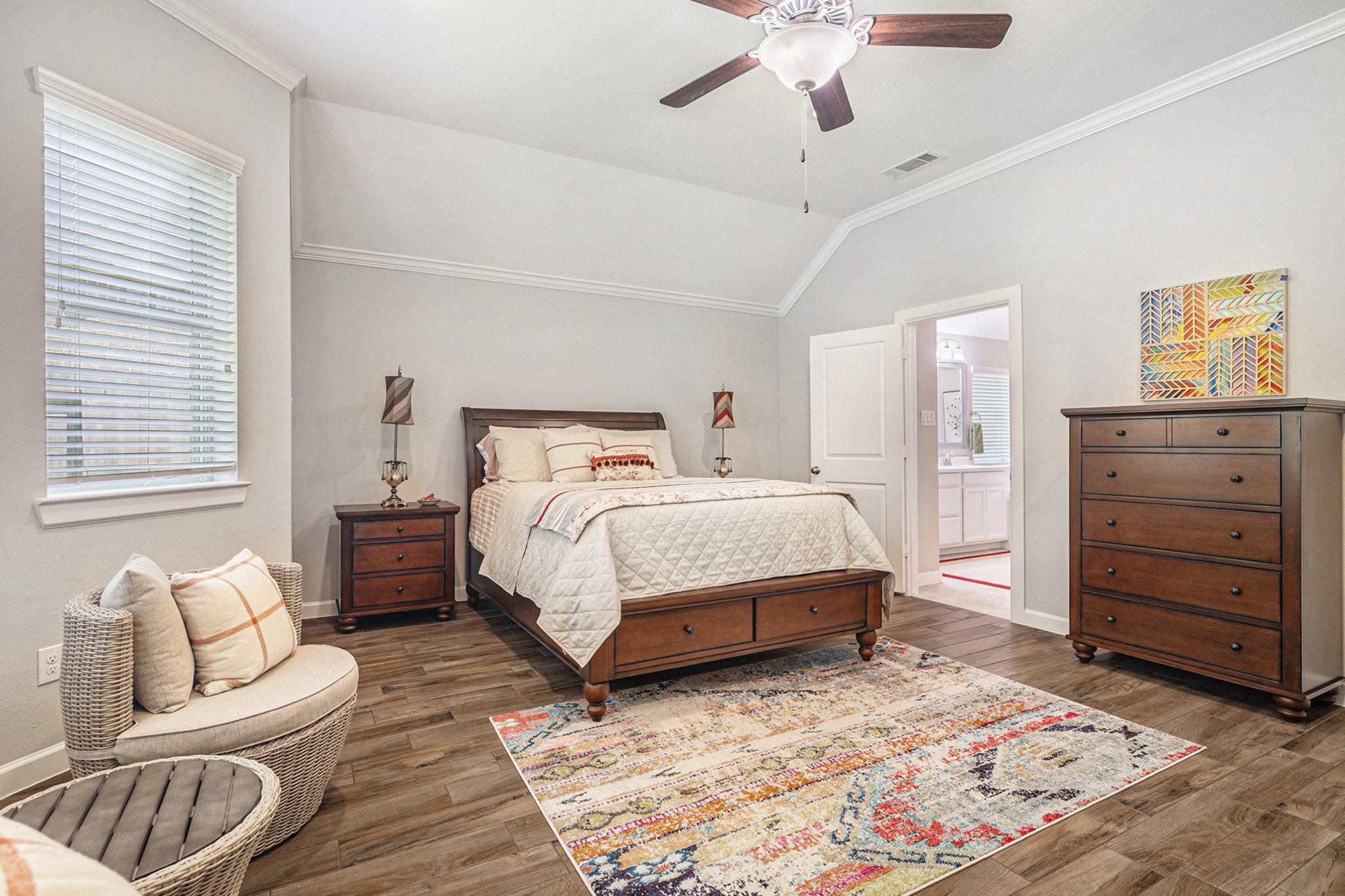 1126 Audrey Trail Tomball, TX 77375 - Photo 20 of 35 a bedroom with a bed and ceiling fan