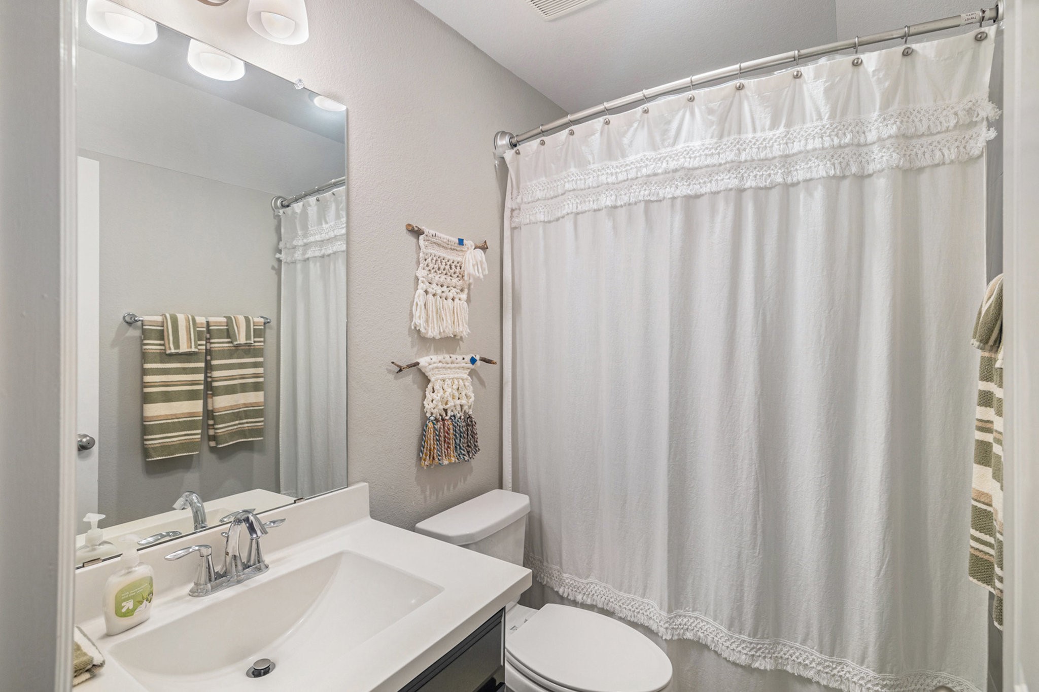 1126 Audrey Trail Tomball, TX 77375 - Photo 29 of 35 a bathroom with a sink and a mirror