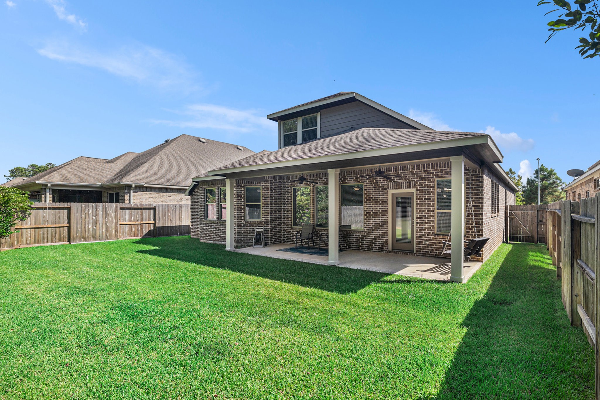 1126 Audrey Trail Tomball, TX 77375 - Photo 32 of 35 a front view of a house with a yard