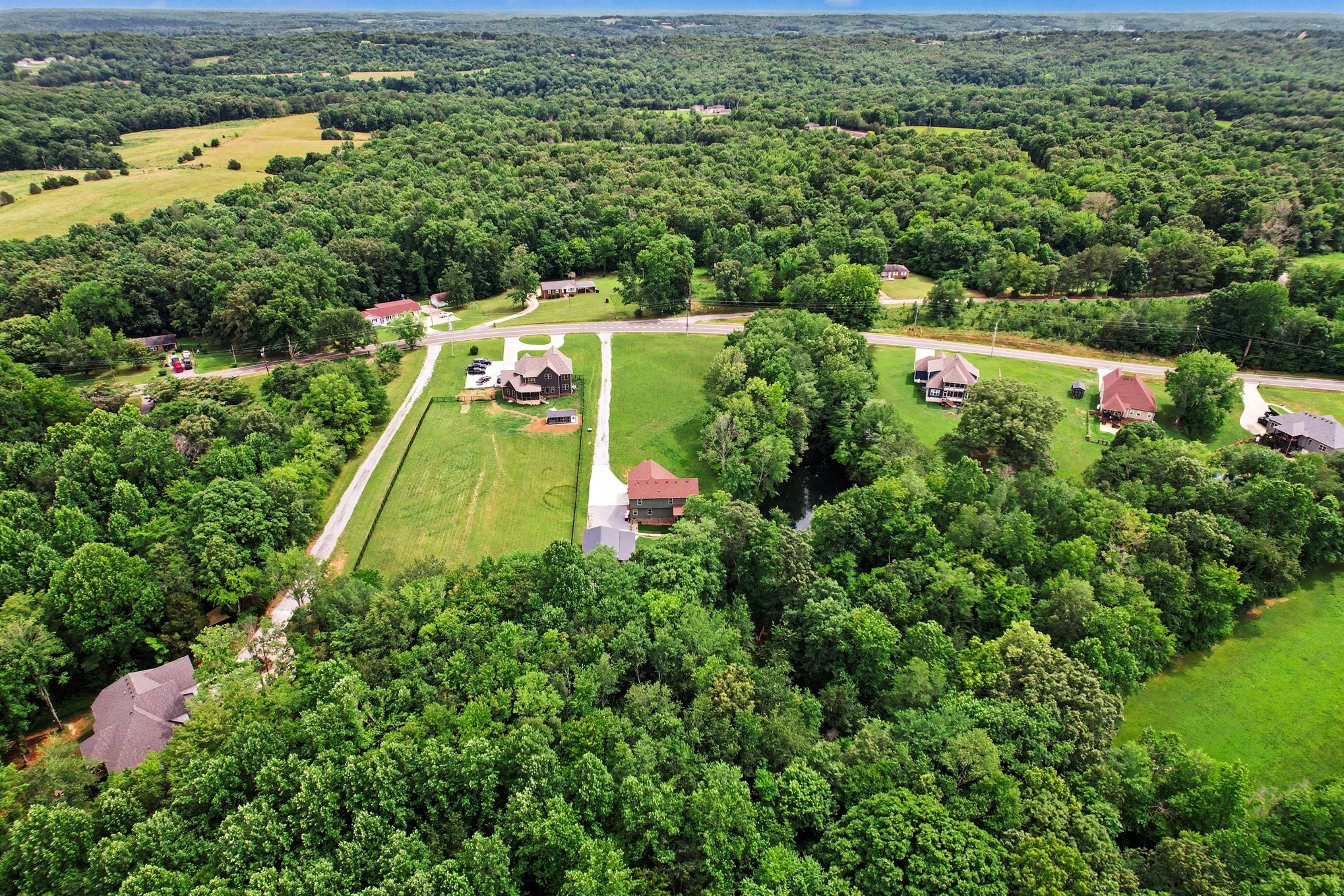1415 Southside Road Southside, TN 37171 - Photo 33 of 35 an aerial view of residential house with outdoor space and trees all around