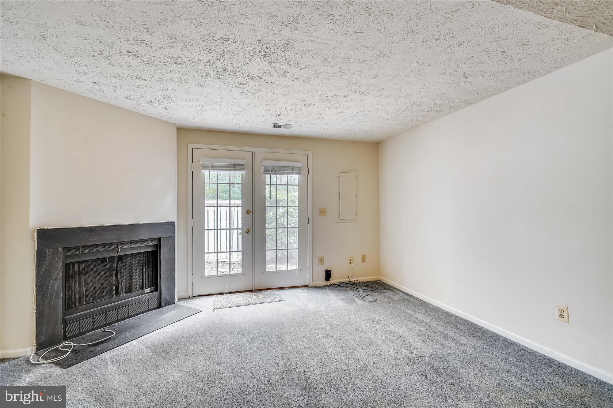 1939 Belmont Ridge Court Reston, VA 20191 - Photo 17 of 39 Lower level recreation / game room with fireplace.