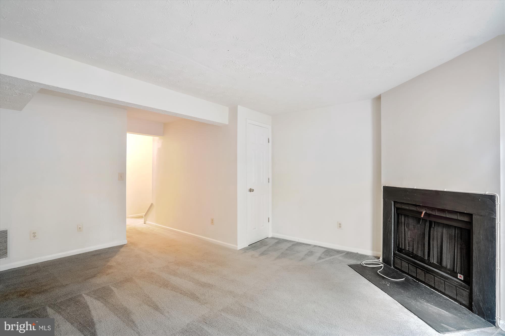1939 Belmont Ridge Court Reston, VA 20191 - Photo 18 of 39 Recreation / game room with fireplace.