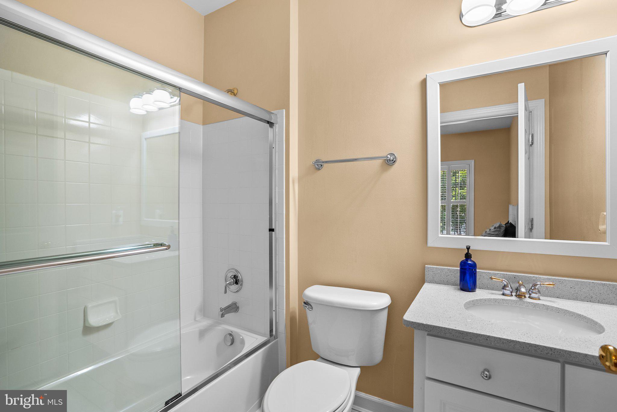 869 Still Creek Lane Gaithersburg, MD 20878 - Photo 29 of 58 a bathroom with a sink toilet tub and shower