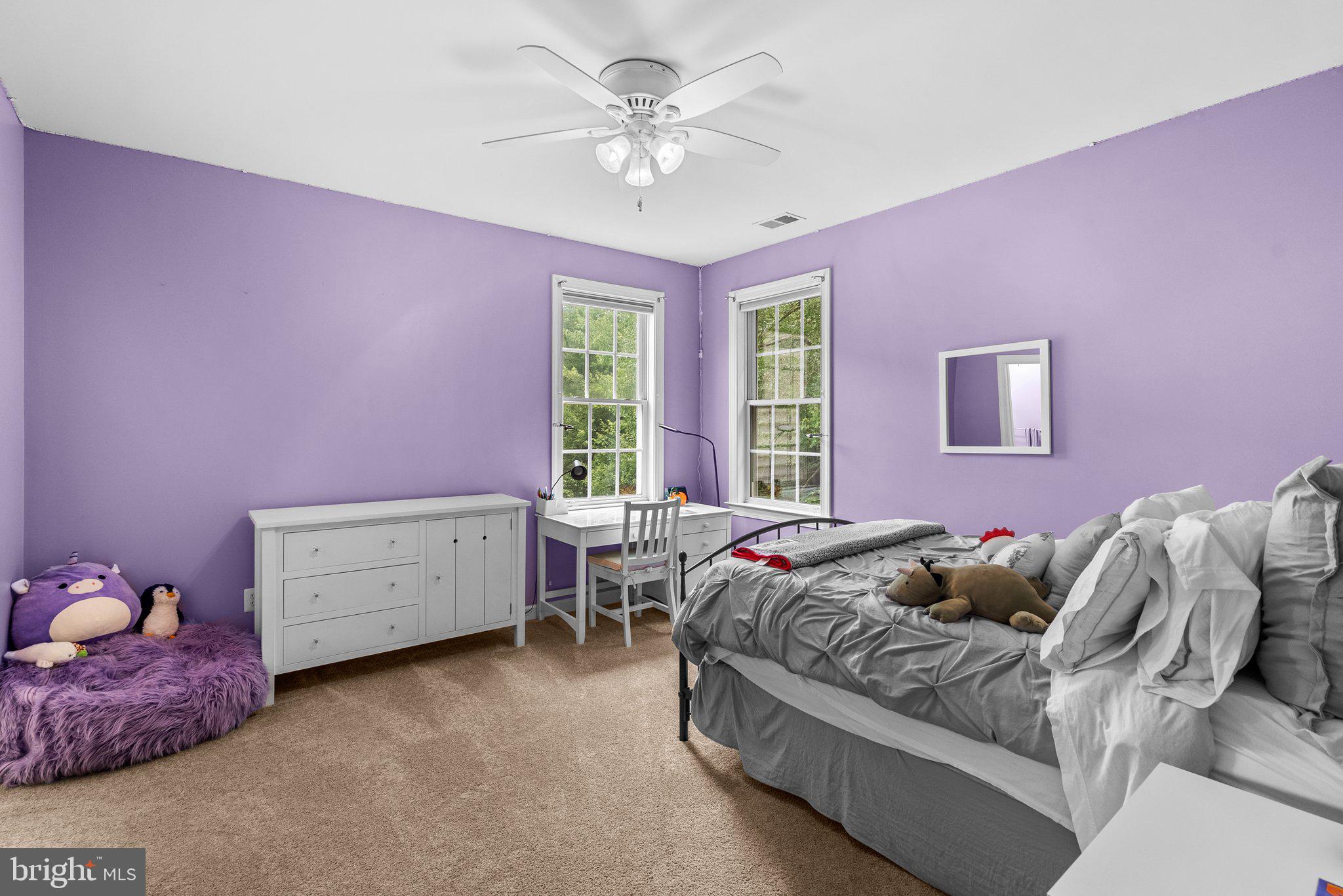 869 Still Creek Lane Gaithersburg, MD 20878 - Photo 30 of 58 a bed room with a bed and a window