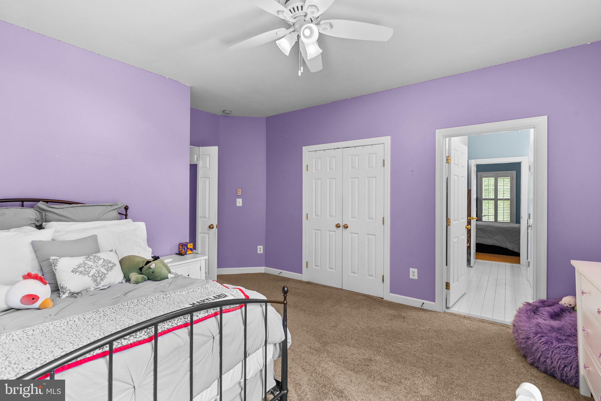 869 Still Creek Lane Gaithersburg, MD 20878 - Photo 31 of 58 a bedroom with furniture and a chandelier