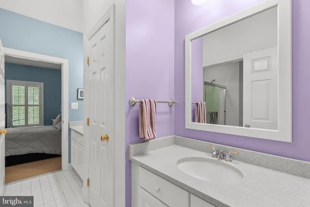 a bathroom with a shower and a toilet