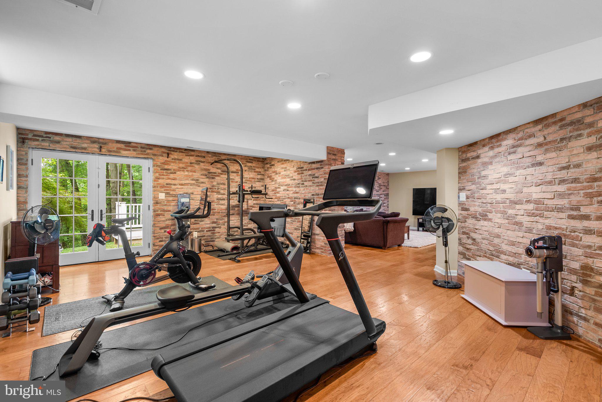869 Still Creek Lane Gaithersburg, MD 20878 - Photo 38 of 58 a view of a room with gym equipment