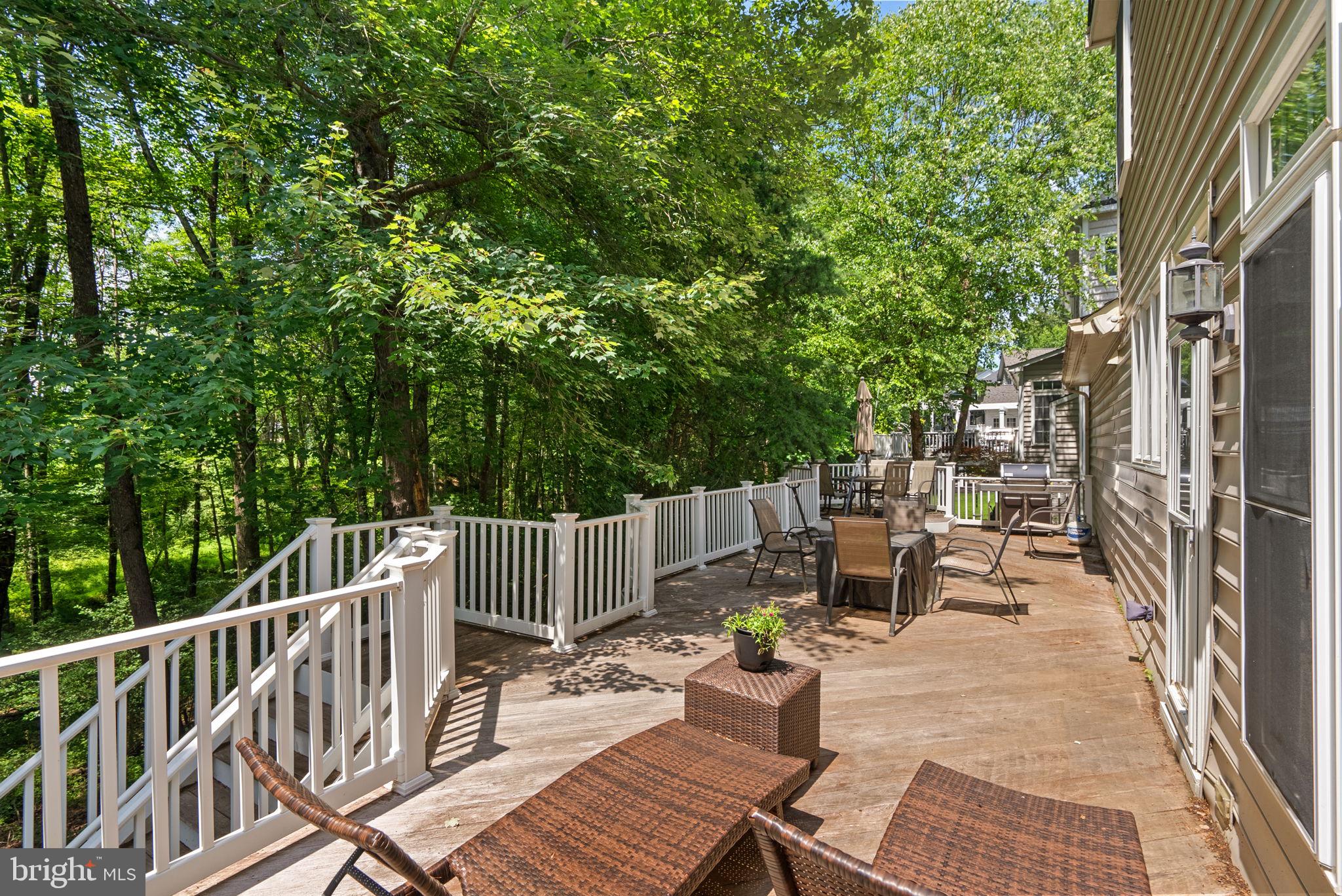 869 Still Creek Lane Gaithersburg, MD 20878 - Photo 48 of 58 a view of balcony with chairs and wooden fence