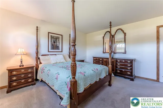 a en suite bathroom with a sink and a mirror