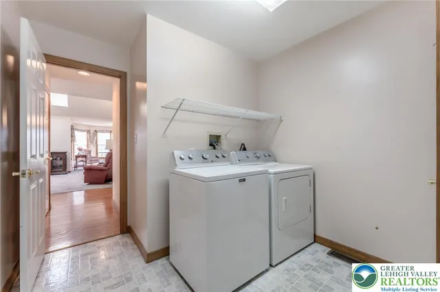 a view of a swimming pool with a yard