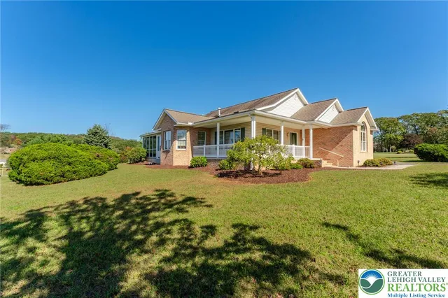 a view of swimming pool from a balcony