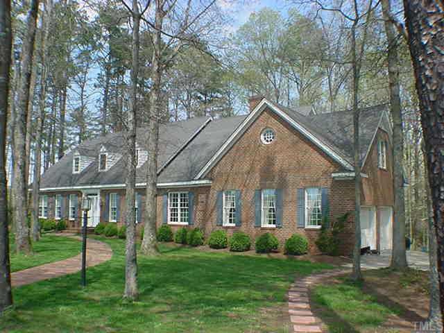 951 Pine Ridge Road Zebulon, NC 27597 - Photo 1 of 1 a front view of a house with a yard