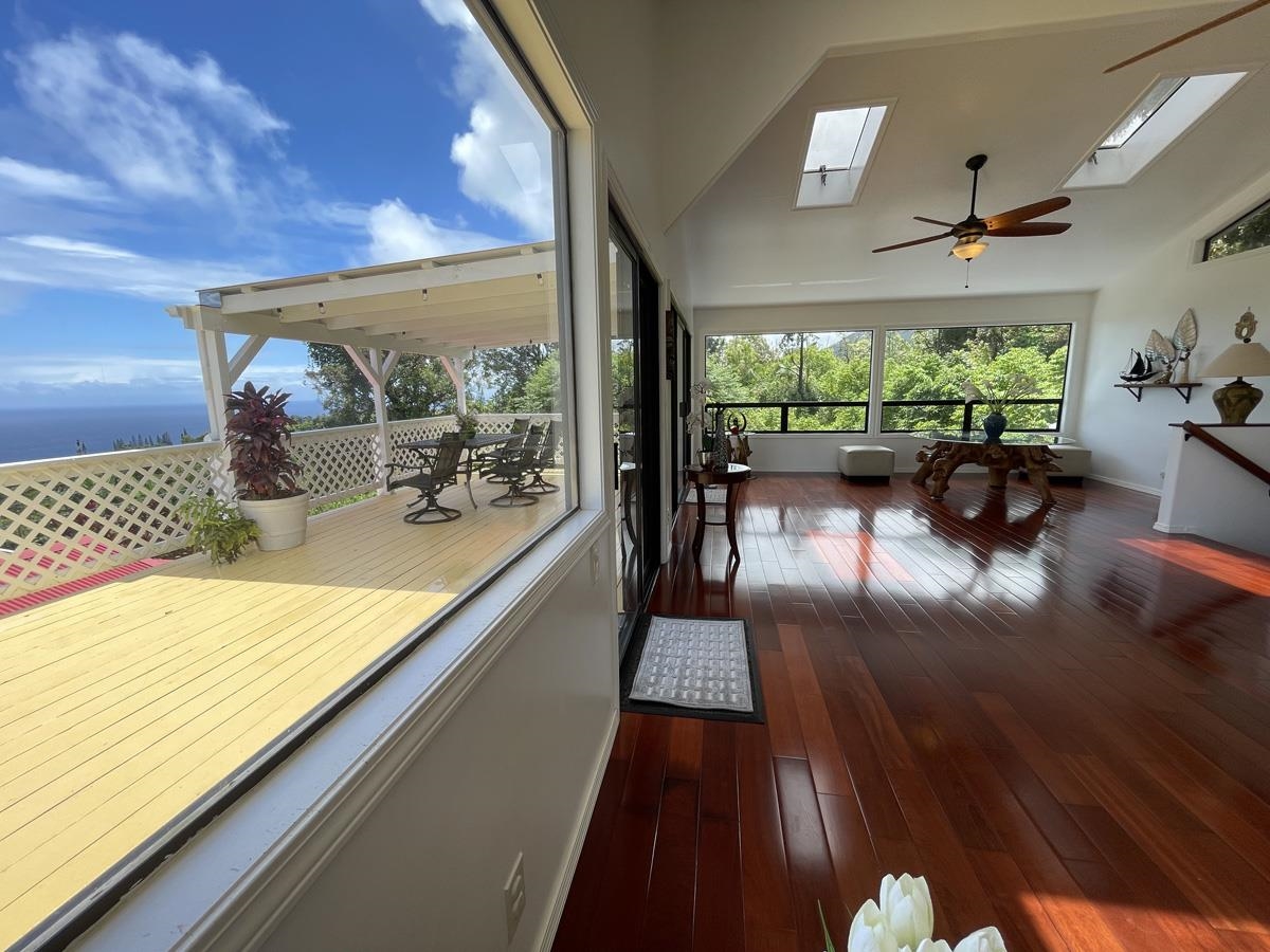 979 Hana Highway Haiku, HI 96708 - Photo 13 of 25 a lobby with furniture and floor to ceiling window