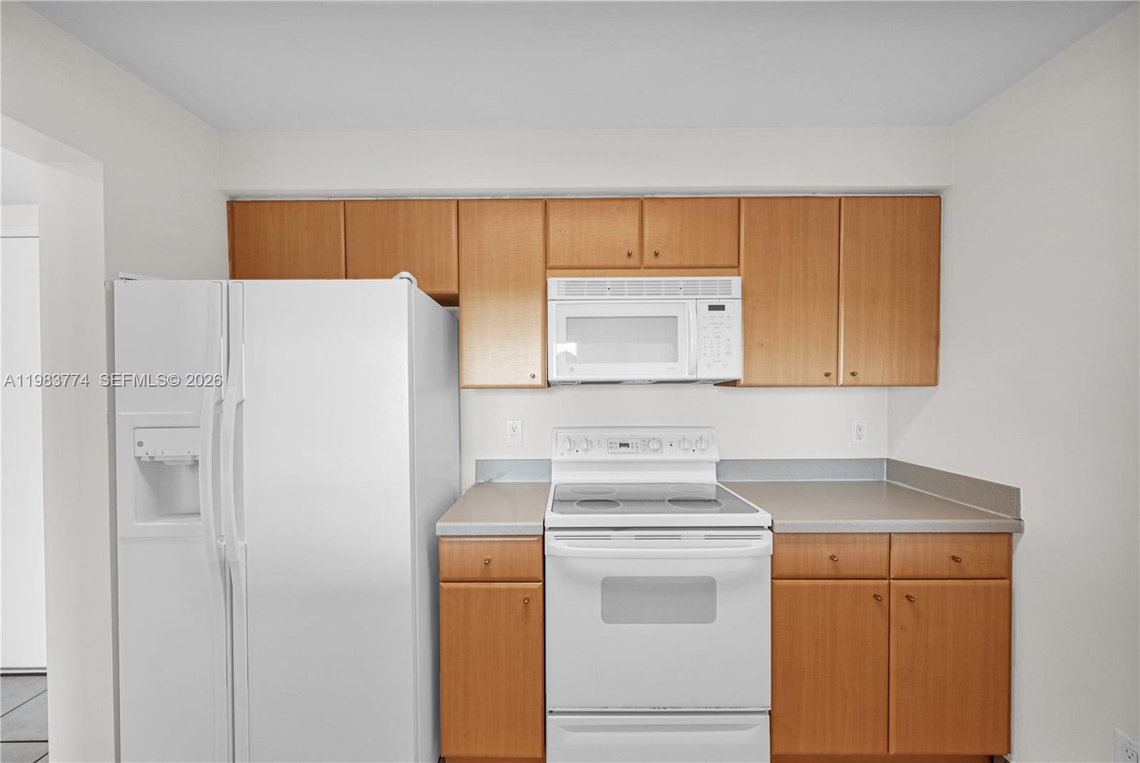 2475 Brickell Avenue, Unit 703 Miami, FL 33129 - Photo 12 of 30 a utility room with dryer and washer