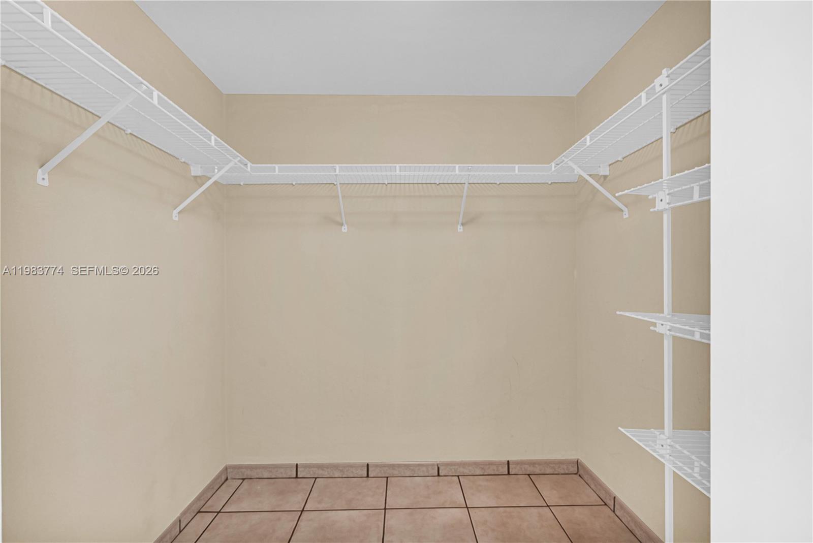 2475 Brickell Avenue, Unit 703 Miami, FL 33129 - Photo 18 of 30 a view of an empty walk in closet