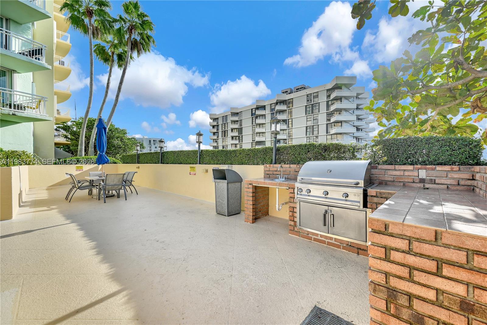 2475 Brickell Avenue, Unit 703 Miami, FL 33129 - Photo 26 of 30 swimming pool view with a seating space