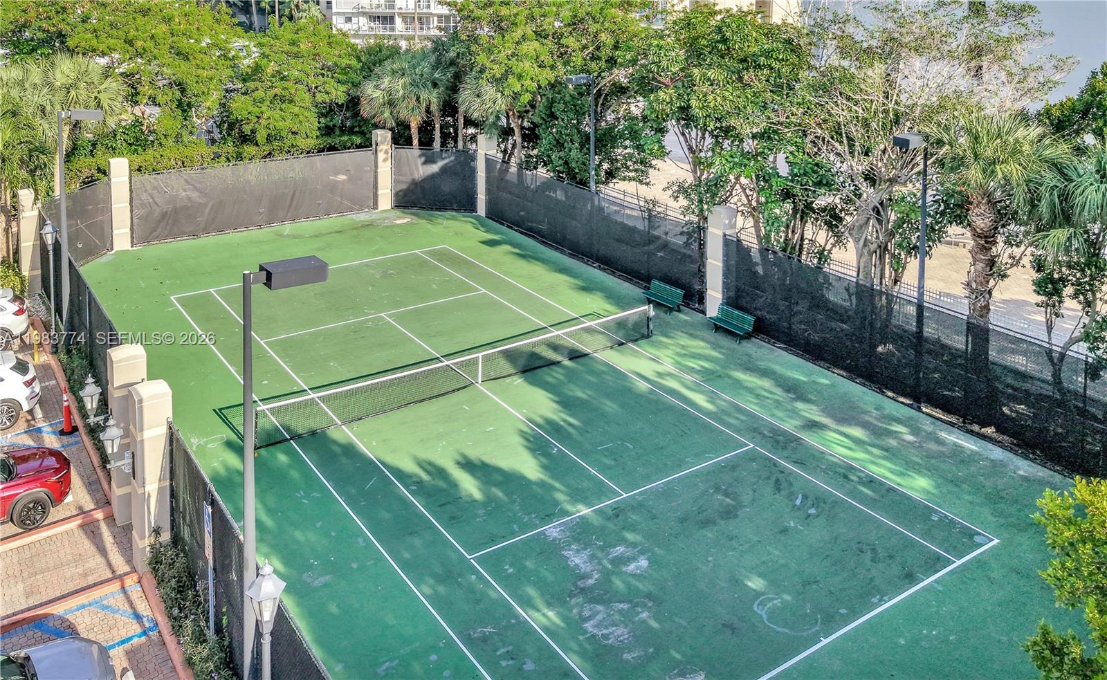 2475 Brickell Avenue, Unit 703 Miami, FL 33129 - Photo 29 of 30 a view of a tennis court