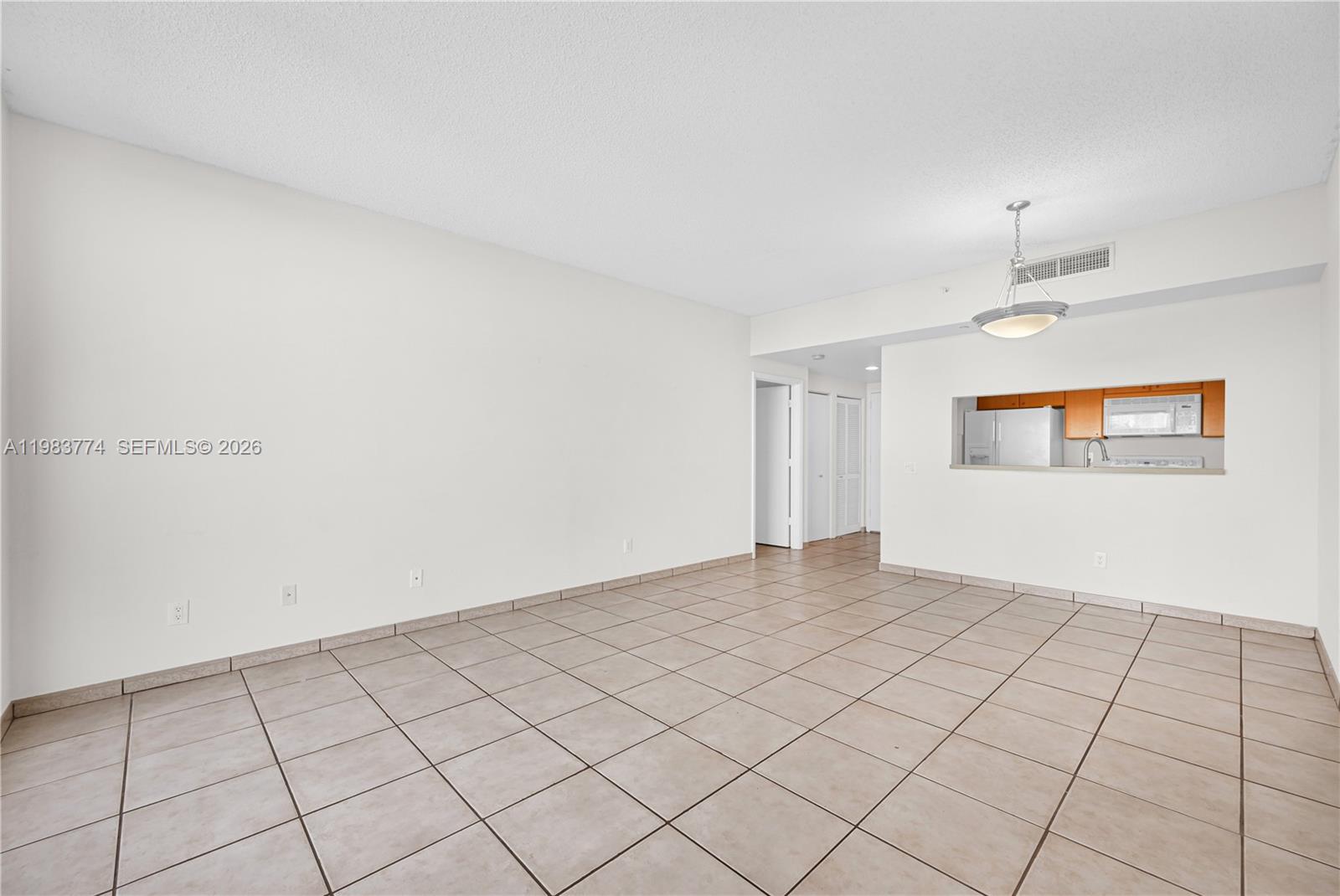 2475 Brickell Avenue, Unit 703 Miami, FL 33129 - Photo 5 of 30 a view of an empty room and window