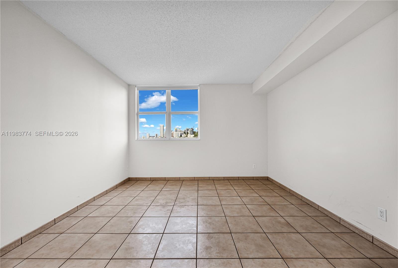 2475 Brickell Avenue, Unit 703 Miami, FL 33129 - Photo 8 of 30 a view of an empty room and window
