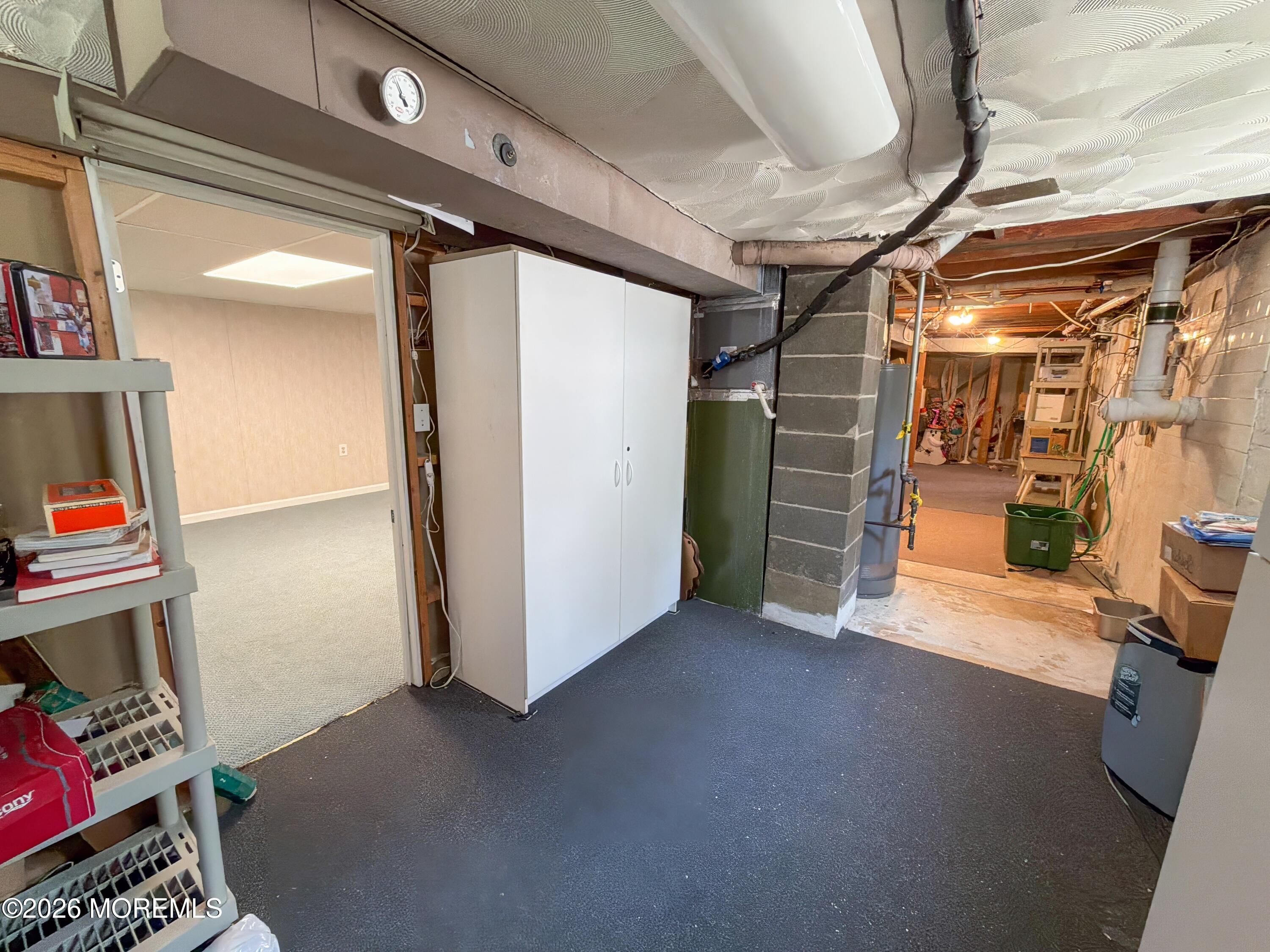4 Glen Road Howell, NJ 07731 - Photo 33 of 48 4 Glen Rd Basement Storage Side