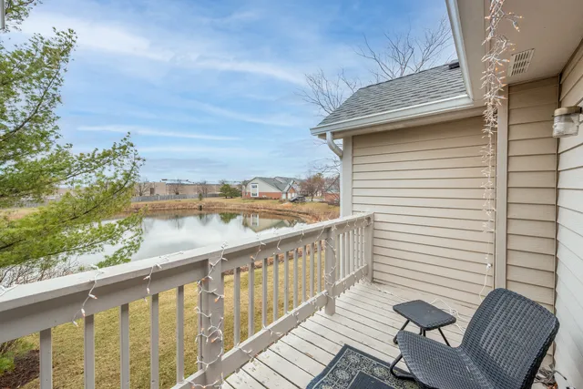 a kitchen with granite countertop a sink stainless steel appliances and cabinets