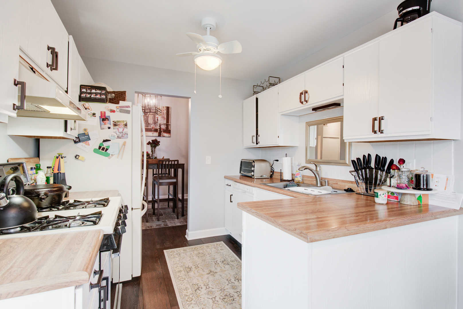 2458 Charleston Drive, Unit 6 Schaumburg, IL 60193 - Photo 16 of 31 a kitchen with stainless steel appliances granite countertop a sink stove and refrigerator