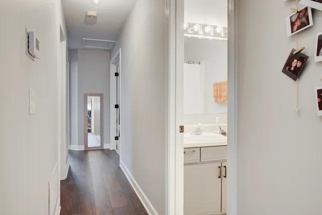 a bed room with furniture and a dresser