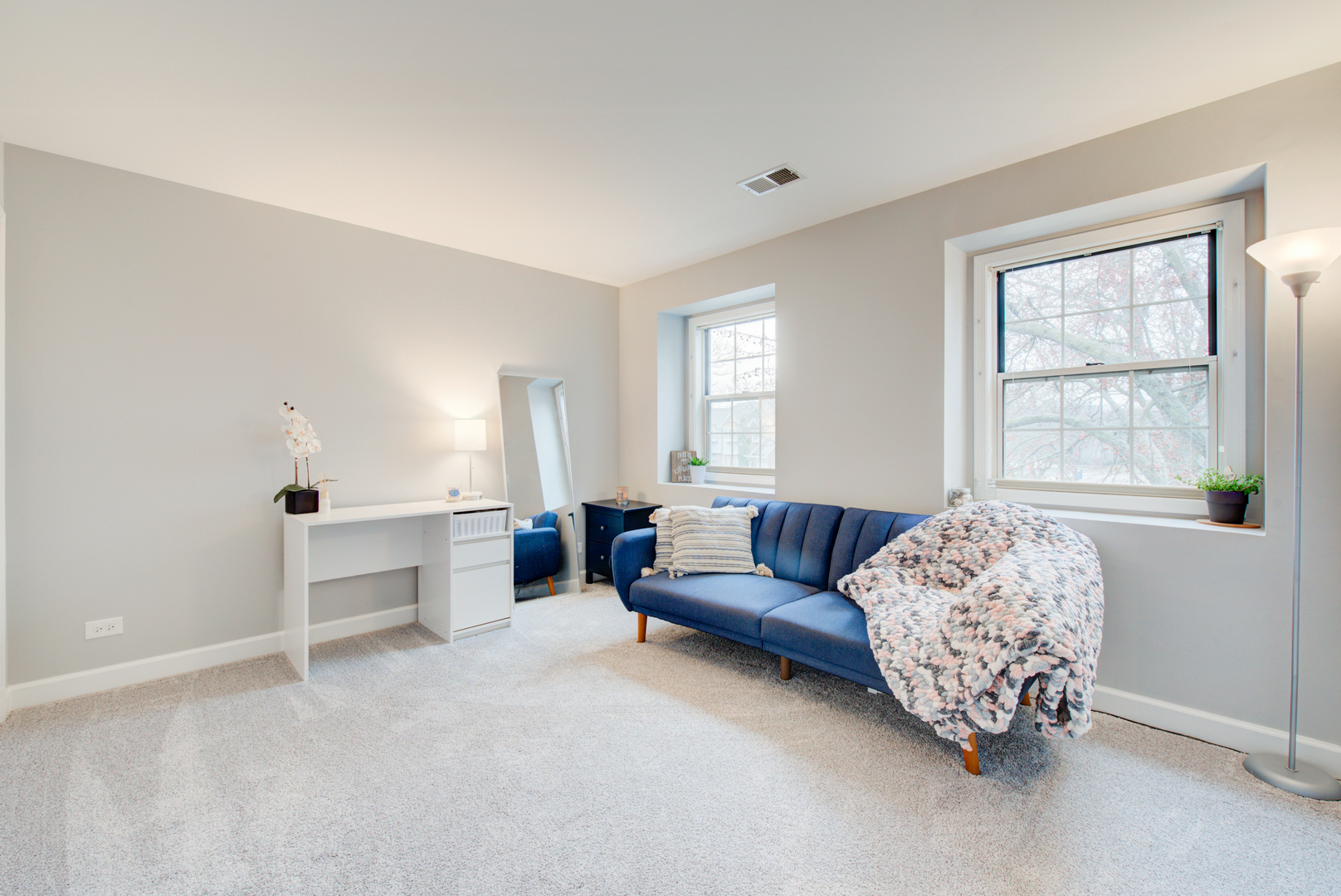 2458 Charleston Drive, Unit 6 Schaumburg, IL 60193 - Photo 29 of 31 a living room with furniture and a window