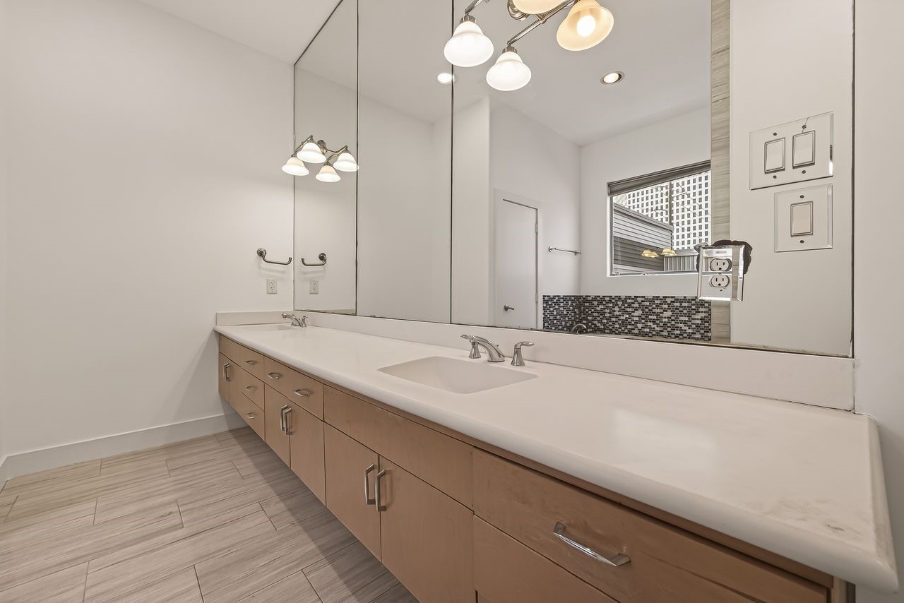 724 Ruthven Street Houston, TX 77019 - Photo 34 of 44 Primary bath features double sinks, separate shower and soaking tub