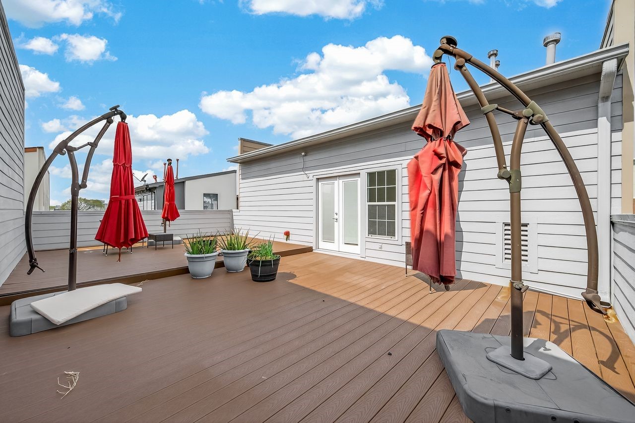 724 Ruthven Street Houston, TX 77019 - Photo 42 of 44 Rooftop deck with city of Downtown Houston views!