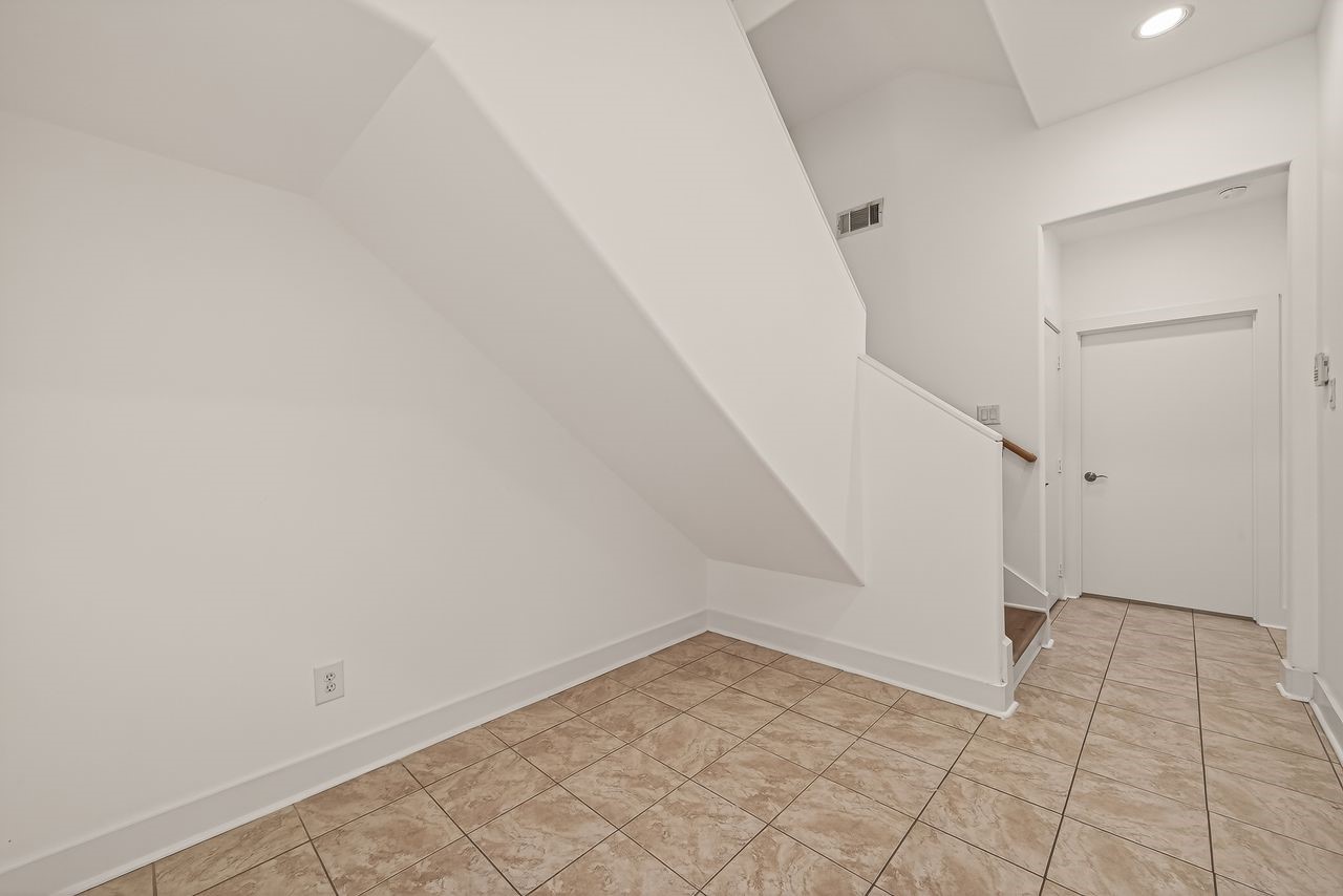 724 Ruthven Street Houston, TX 77019 - Photo 5 of 44 Brand new flooring upstairs on all levels and new light and bright paint throughout.