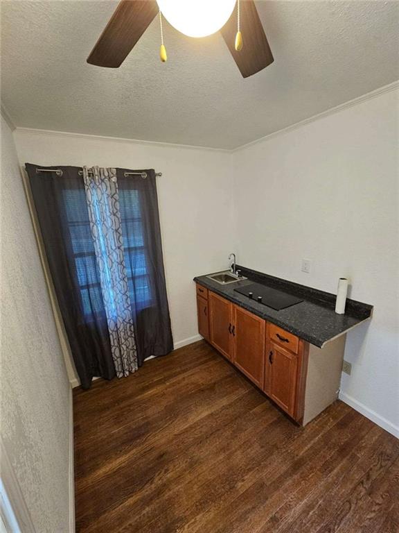 389 Collins Road Toccoa, GA 30577 - Photo 10 of 15 a kitchen with wooden floor and window