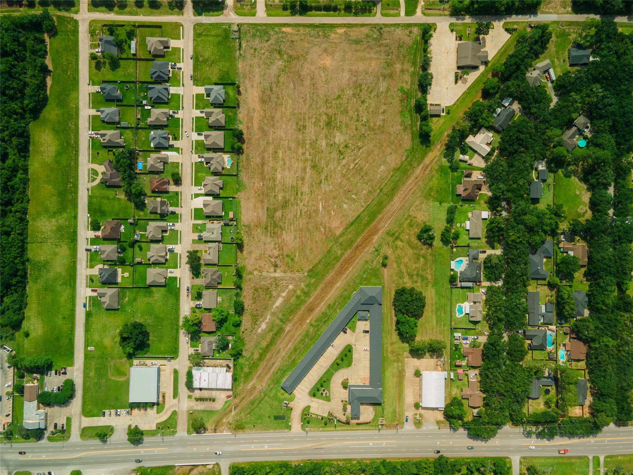 0 Karankawa Street Angleton, TX 77515 - Photo 22 of 22 a view of a large building
