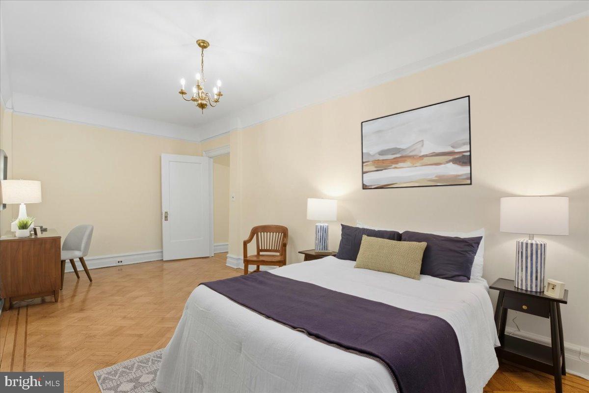 2126 Connecticut Avenue Northwest, Unit 28 Washington, DC 20008 - Photo 20 of 34 a bedroom with bed and window