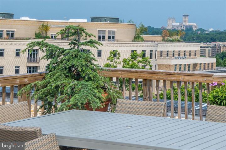 2126 Connecticut Avenue Northwest, Unit 28 Washington, DC 20008 - Photo 29 of 34 a view of a balcony with wooden floor