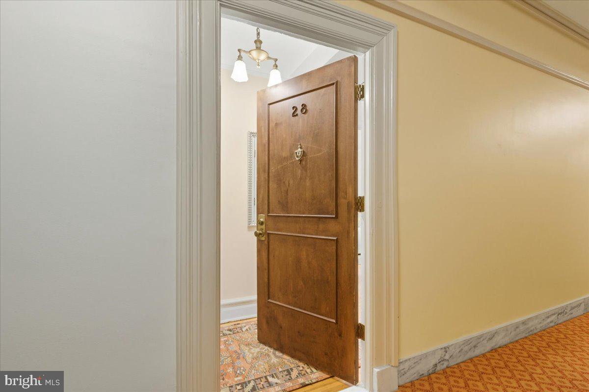 2126 Connecticut Avenue Northwest, Unit 28 Washington, DC 20008 - Photo 3 of 34 a view of a bathroom from a hallway